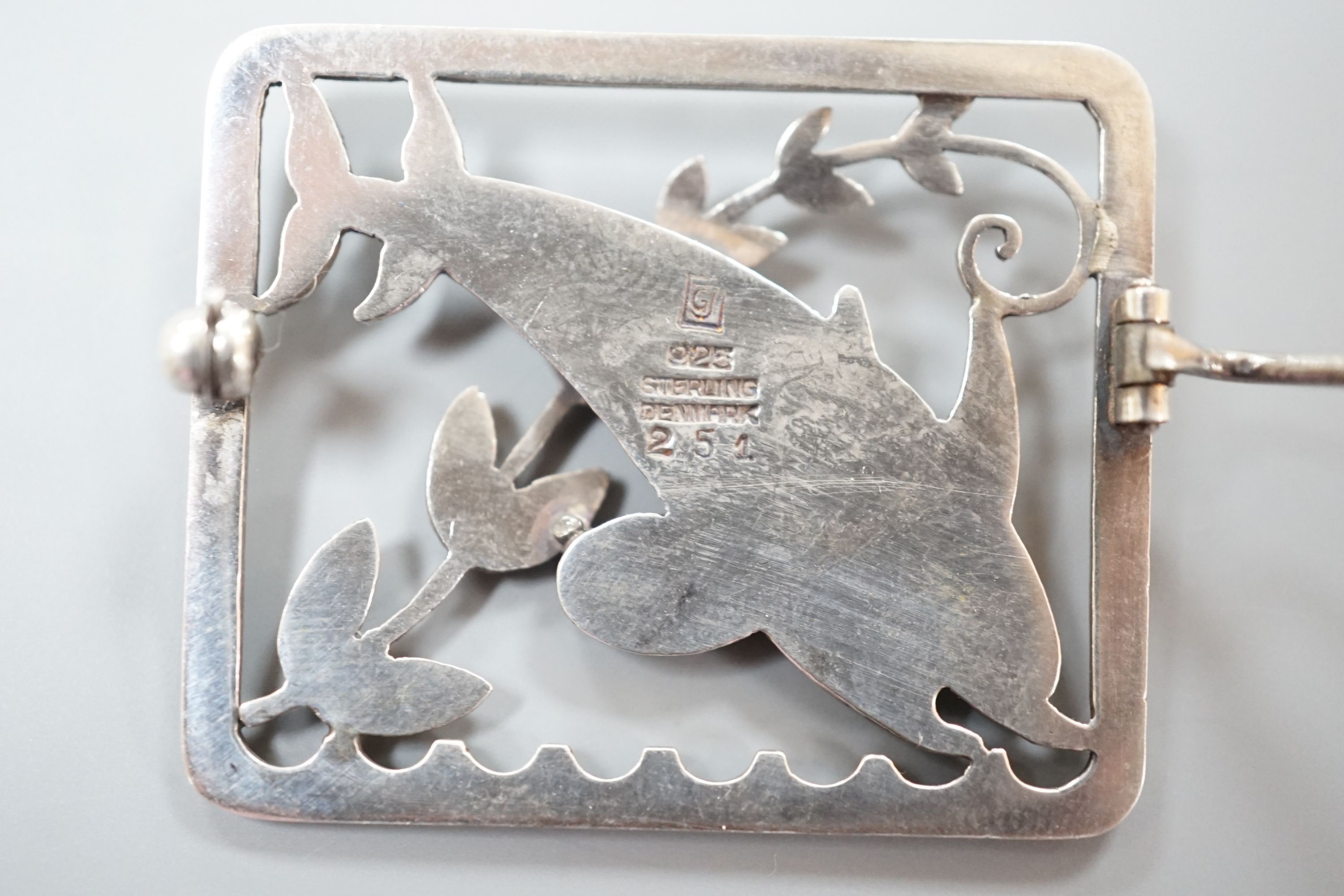 A Georg Jensen (designed by Arno Malinowski) sterling 'twin dolphin' rectangular brooch, no. 251, 36mm.